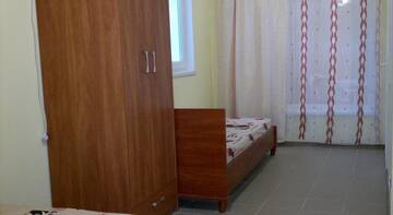 Фото номера Стандартный семейный номер Гостиница Guest house Atlas г. Береговое 8